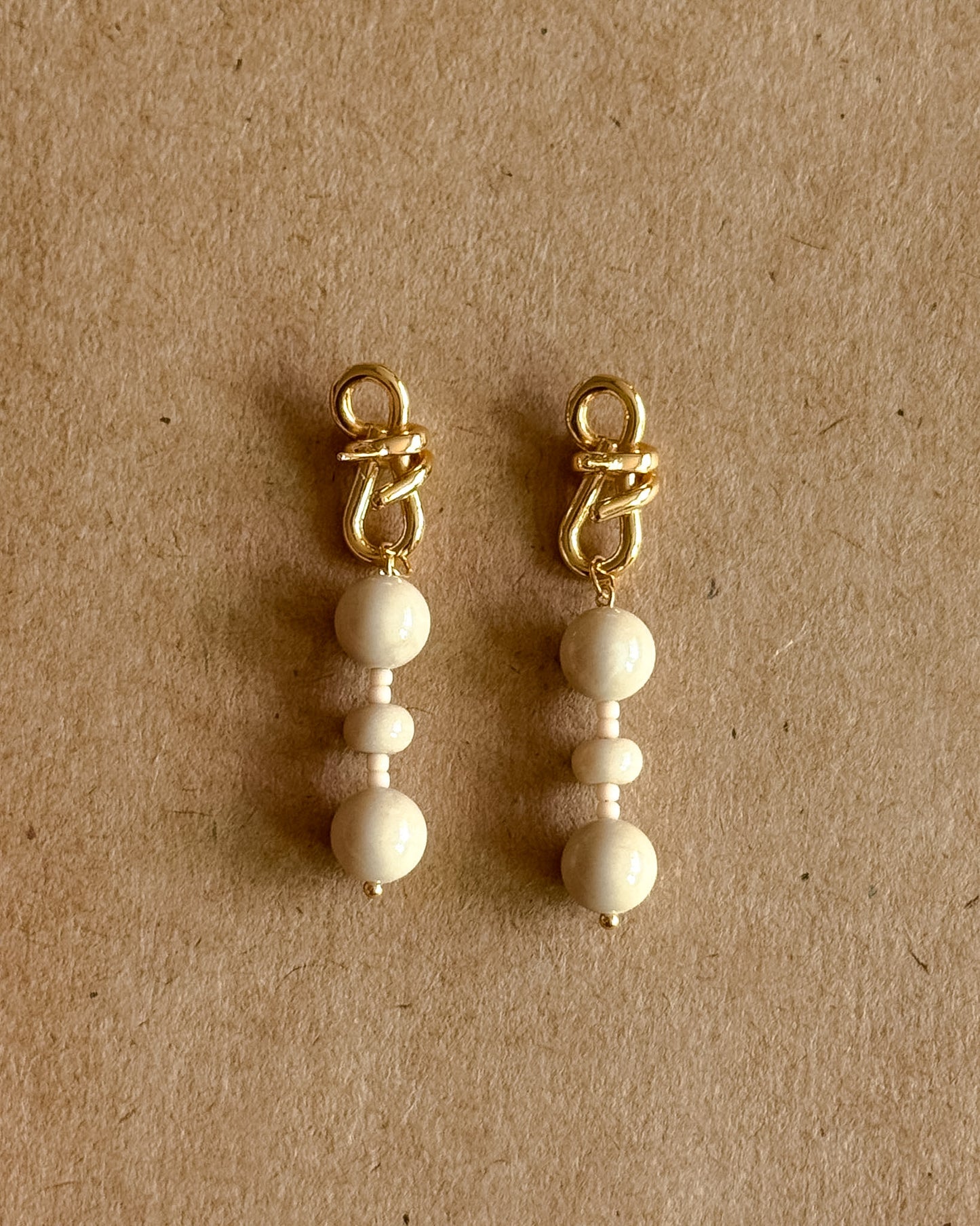 White fossil jasper knot Earrings